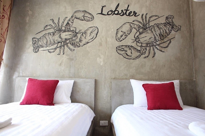Imagen de la habitación del Hotel Phan Loft Koh Larn. Foto 8