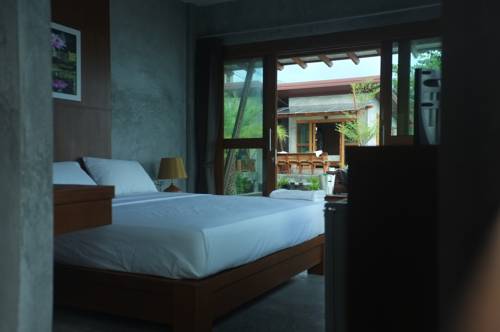 Imagen de la habitación del Hotel Phangan Palm Beach Resort. Foto 14