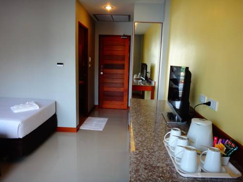 Imagen de la habitación del Hotel Phangan Pearl Villa. Foto 16