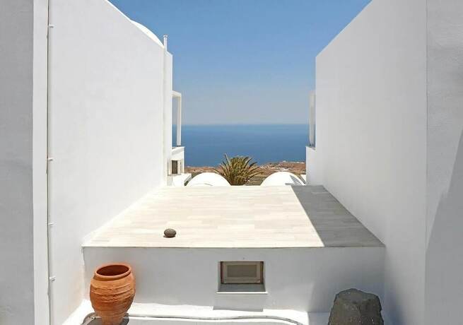 Imagen de la habitación del Hotel Phaos Santorini Suites. Foto 16