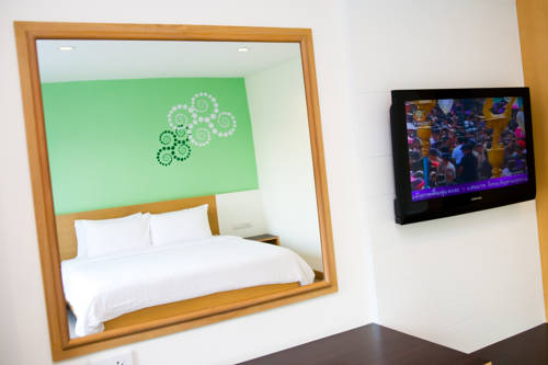 Imagen de la habitación del Hotel Phavina Grand Boutique. Foto 4