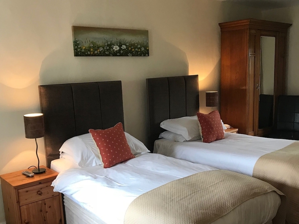 Imagen de la habitación del Hotel Pheasant Inn. Foto 4
