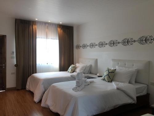 Imagen de la habitación del Hotel Phetcharat Grand Maesot. Foto 7