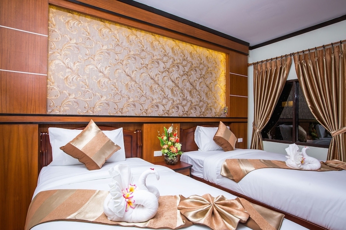 Imagen de la habitación del Hotel Phi Phi Andaman Beach Resort. Foto 8