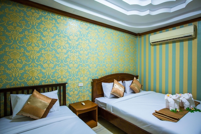 Imagen de la habitación del Hotel Phi Phi Andaman Beach Resort. Foto 18