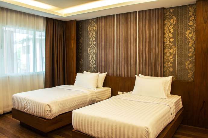 Imagen de la habitación del Hotel Phi Phi Cliff Beach Resort. Foto 10