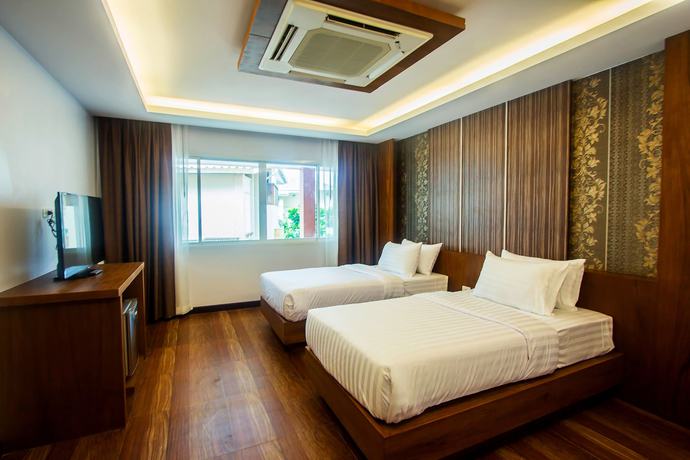 Imagen de la habitación del Hotel Phi Phi Cliff Beach Resort. Foto 13