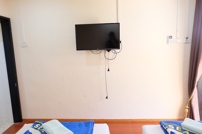Imagen de la habitación del Hotel Phi Phi Sandsea View Resort. Foto 10