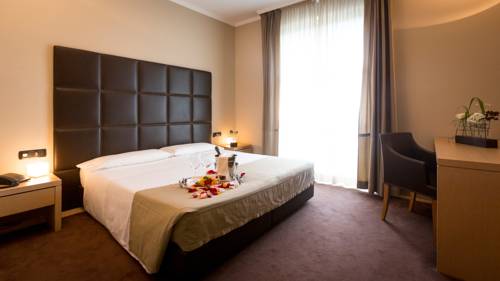 Imagen de la habitación del Hotel Phi Piajo. Foto 9