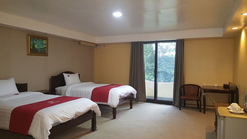 Imagen de la habitación del Hotel Phil Oasis Hotel and Resorts. Foto 2