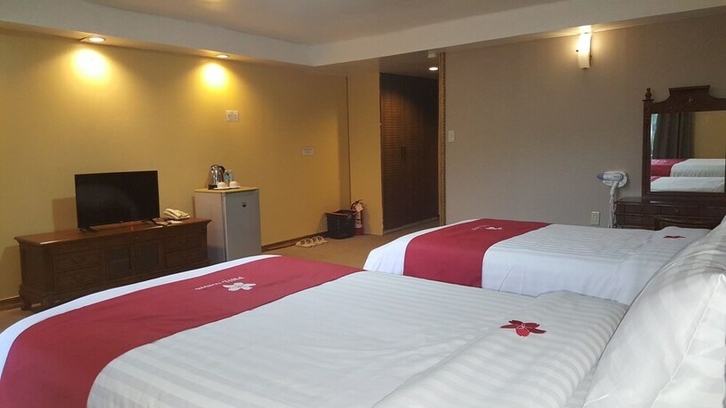 Imagen de la habitación del Hotel Phil Oasis Hotel and Resorts. Foto 10