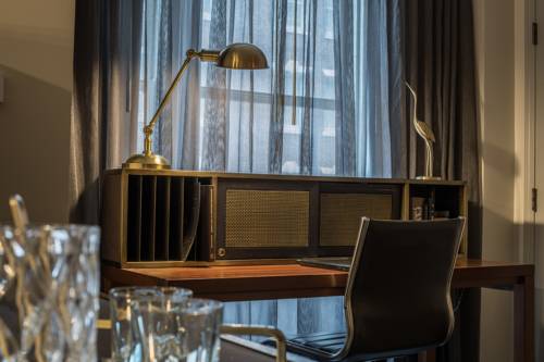 Imagen de la habitación del Hotel Phillips Kansas City Curio Collection By Hilton. Foto 8