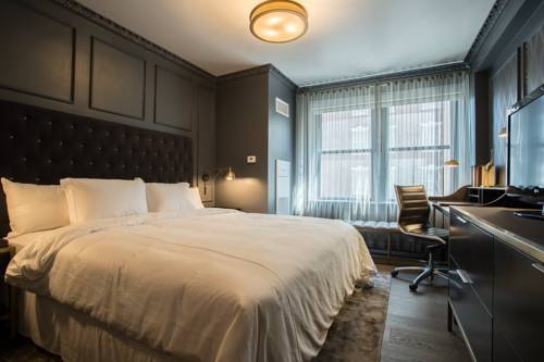 Imagen de la habitación del Hotel Phillips Kansas City Curio Collection By Hilton. Foto 12