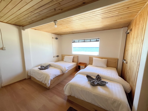 Imagen de la habitación del Hotel Phinisi Hostel Bira. Foto 9