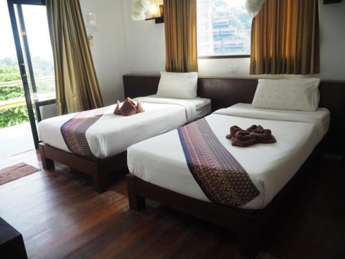 Imagen de la habitación del Hotel Phitharom PP Resort. Foto 5
