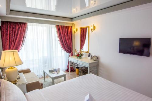 Imagen de la habitación del Hotel Phoenicia Blue View. Foto 15