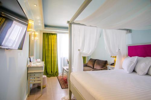 Imagen de la habitación del Hotel Phoenicia Blue View. Foto 17