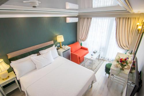 Imagen de la habitación del Hotel Phoenicia Blue View. Foto 19