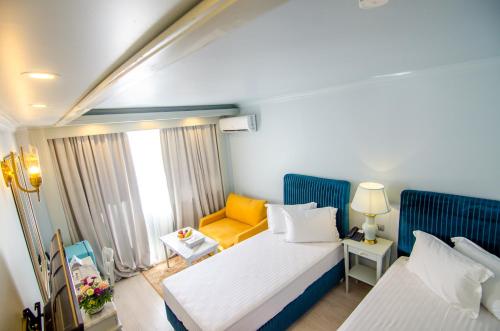 Imagen de la habitación del Hotel Phoenicia Blue View. Foto 20