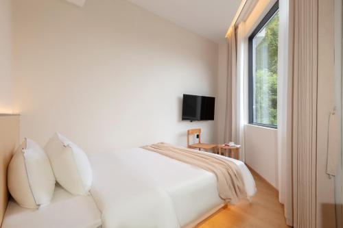 Imagen general del Hotel Phoenix Ancient City Courtyard凤凰古城庭院酒店. Foto 8