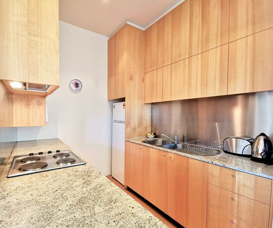 Imagen de la habitación del Hotel Phoenix Apartments. Foto 23