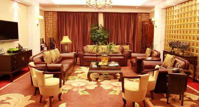 Imagen del bar/restaurante del Hotel Phoenix Garden Hotel - Yantai. Foto 2