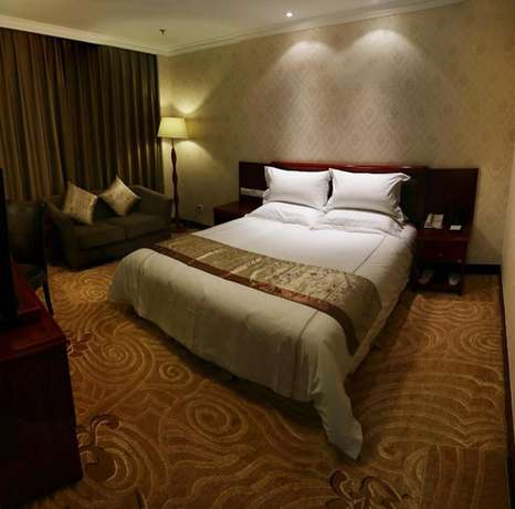 Imagen de la habitación del Hotel Phoenix Garden Hotel - Yantai. Foto 7