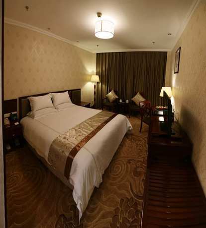 Imagen de la habitación del Hotel Phoenix Garden Hotel - Yantai. Foto 8