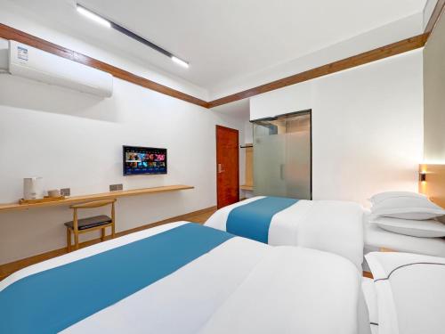 Imagen de la habitación del Hotel 凤凰古城Phoenix Haven. Foto 17