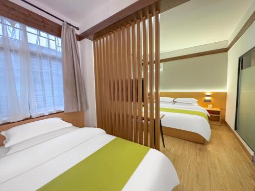 Imagen de la habitación del Hotel 凤凰古城Phoenix Haven. Foto 19