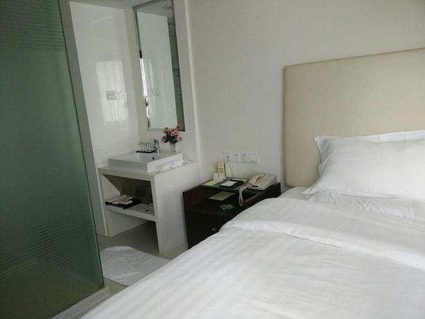 Imagen de la habitación del Hotel Phoenix Jinghua Hotel. Foto 2