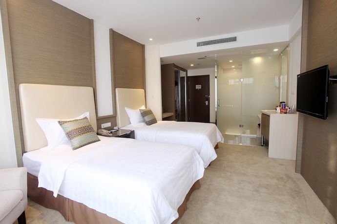 Imagen de la habitación del Hotel Phoenix Jinghua Hotel. Foto 4