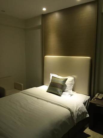 Imagen de la habitación del Hotel Phoenix Jinghua Hotel. Foto 7
