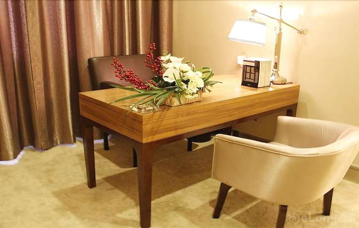Imagen de la habitación del Hotel Phoenix Jinghua Hotel. Foto 9