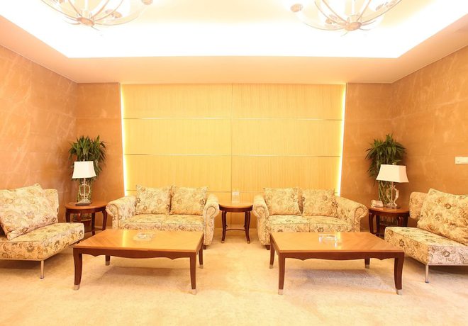 Imagen de la habitación del Hotel Phoenix Jinghua Hotel. Foto 10