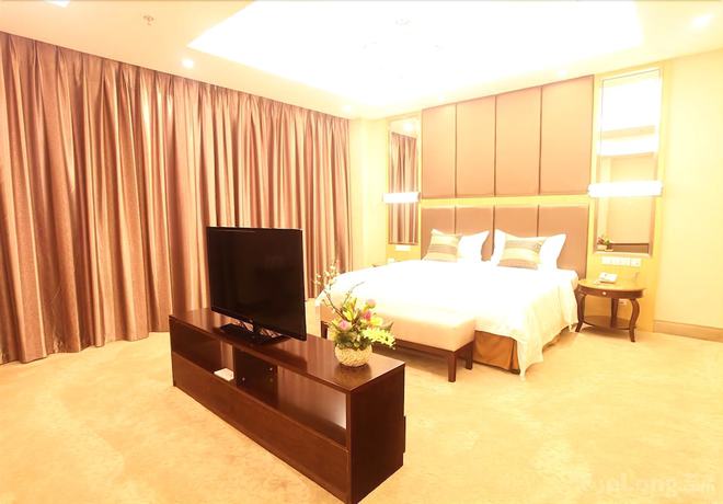 Imagen de la habitación del Hotel Phoenix Jinghua Hotel. Foto 11