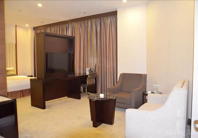 Imagen de la habitación del Hotel Phoenix Jinghua Hotel. Foto 14