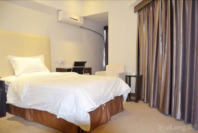 Imagen de la habitación del Hotel Phoenix Jinghua Hotel. Foto 16