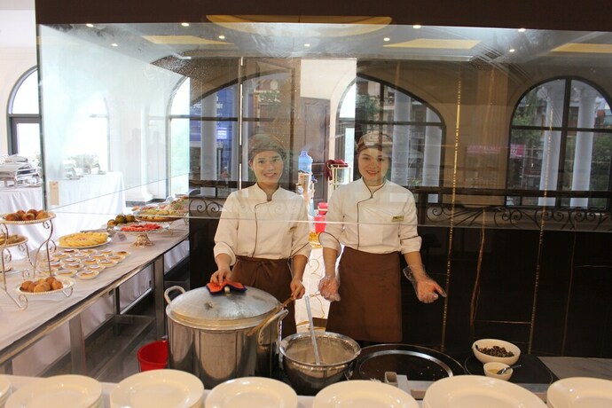 Imagen del bar/restaurante del Hotel Phoenix, Vi Thanh. Foto 19