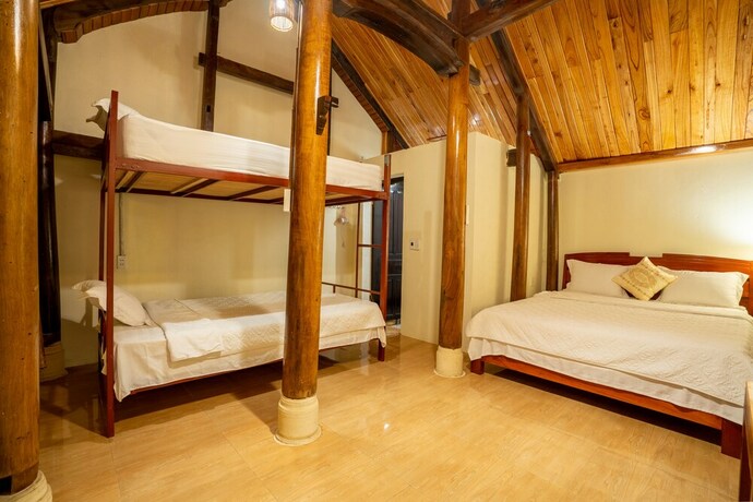 Imagen de la habitación del Hotel Phong Nha Coco House. Foto 16