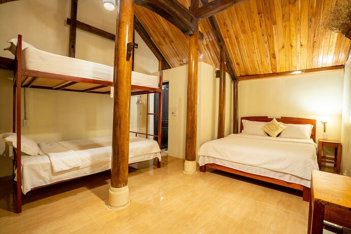 Imagen de la habitación del Hotel Phong Nha Coco House. Foto 32