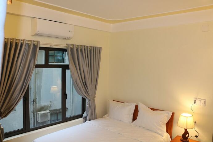 Imagen de la habitación del Hotel Phong Nha Coco Riverside Homestay. Foto 17