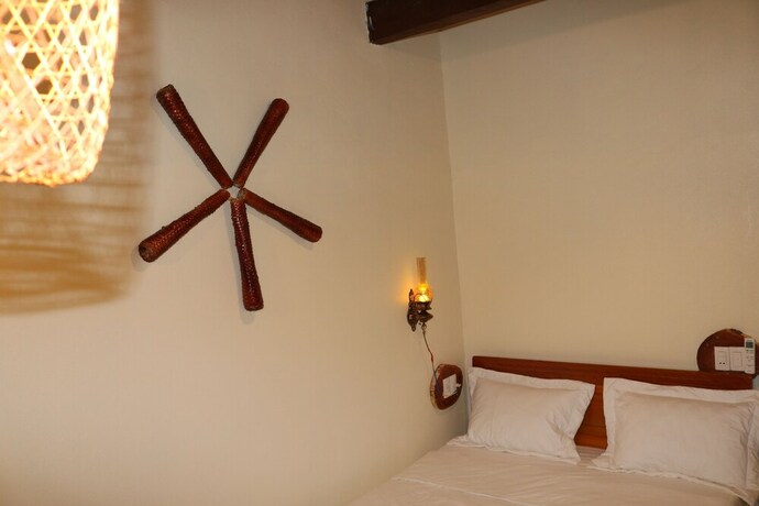 Imagen de la habitación del Hotel Phong Nha Coco Riverside Homestay. Foto 19