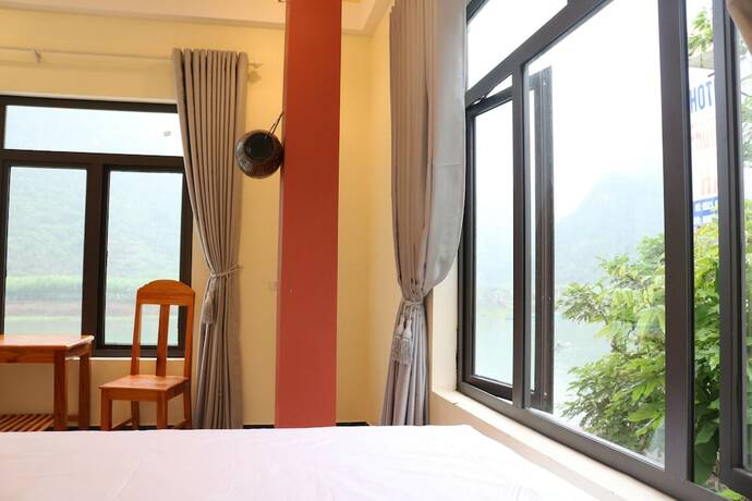 Imagen de la habitación del Hotel Phong Nha Coco Riverside Homestay. Foto 38