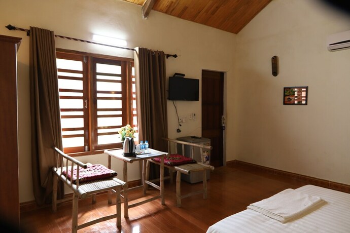 Imagen de la habitación del Hotel Phong Nha Garden House. Foto 21