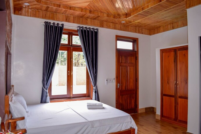 Imagen de la habitación del Hotel Phong Nha Hillside View Bungalow. Foto 15