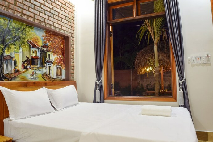 Imagen de la habitación del Hotel Phong Nha Hillside View Bungalow. Foto 16