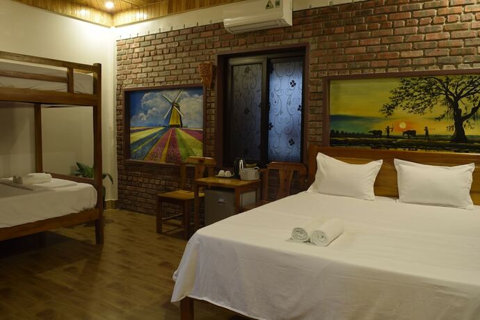 Imagen de la habitación del Hotel Phong Nha Hillside View Bungalow. Foto 21