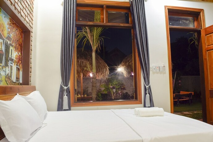 Imagen de la habitación del Hotel Phong Nha Hillside View Bungalow. Foto 24