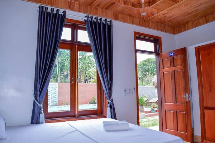 Imagen de la habitación del Hotel Phong Nha Hillside View Bungalow. Foto 26